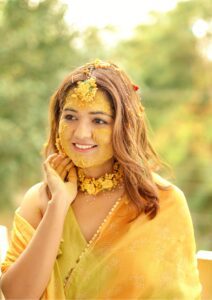 Wedding photographer in Delhi capturing bride’s Haldi ceremony